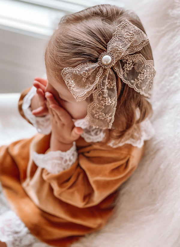 Golden brown embellished lace bow