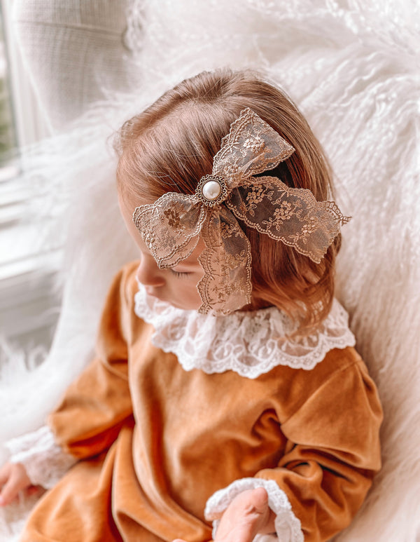 Golden brown embellished lace bow