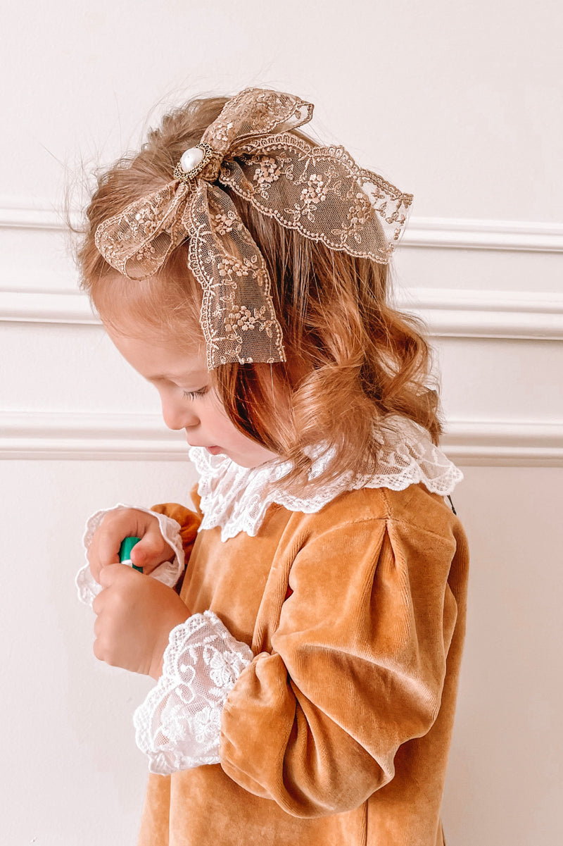 Golden brown embellished lace bow