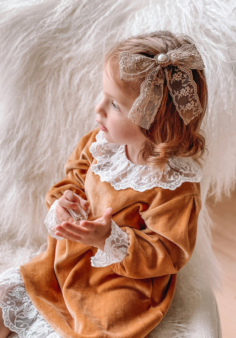 Golden brown embellished lace bow